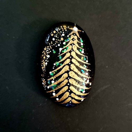 Les galets noirs, or et pailleté