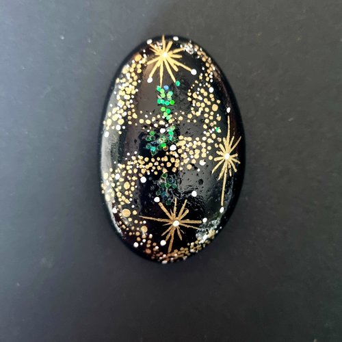 Les galets noirs, or et pailleté