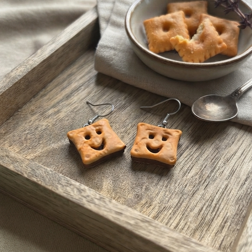 Boucles d’oreilles biscuits souriants fourrés