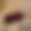 Boucle d'oreille réglisse noir avec sont petit bonbon rouge  rigolo 