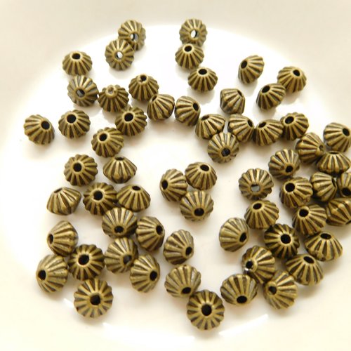 10 perles intercalaire métal bronze forme toupie 5mm