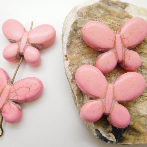 2 perles papillon rose en pierre naturelle , howlite 25mm