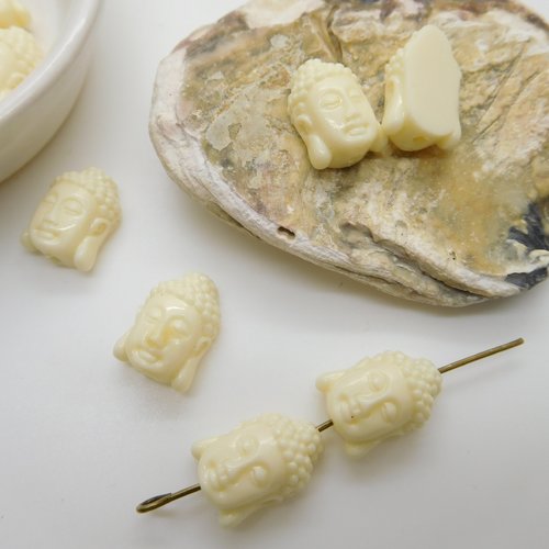 Perles  tête bouddha  blanc en corail de synthèse 15mm