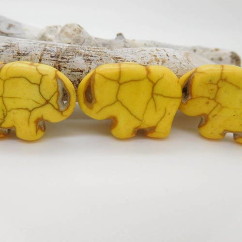 4 perles éléphants jaune 20mm en pierre howlite teintée