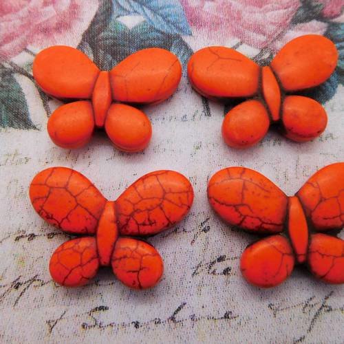 2 perles papillons orange  pierre teintée 35mm