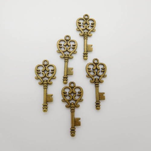 5 breloques clés en métal bronze 32x14mm