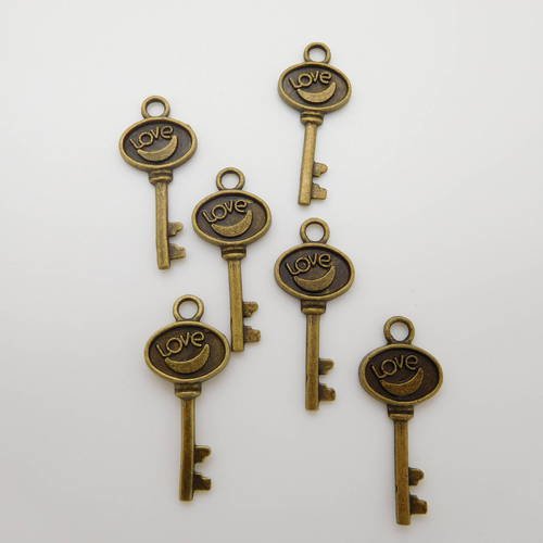 6 breloques clés en métal bronze 30x13mm