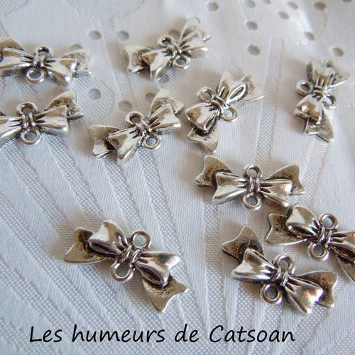 6 noeuds connecteurs  en métal argenté 20x10mm.bonne qualité