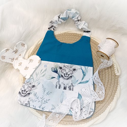 Joli bavoir élastique / maternelle lionceau bleu