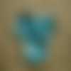 Boutons  ronds  à deux trous en plastique , coloris turquoise nacré , diamètre  32 mm