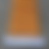 Trois mètres de ruban en synthétique , coloris orange à pois blancs , largeur  7 mm 