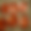 Boutons ronds x 2 en plastique , coloris orange , diamètre 35 mm