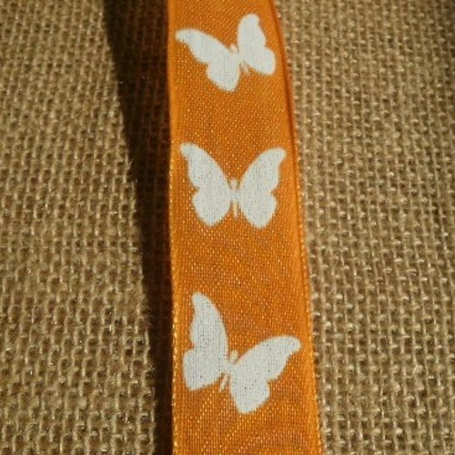 2,5 mètres de ruban en synthétique , coloris orange et papillons blancs , largeur 25 mm