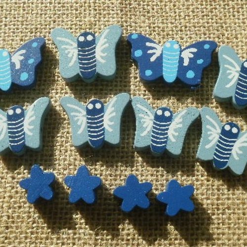 Assortiment de 12 perles papillons et étoiles en bois , coloris bleu et blanc