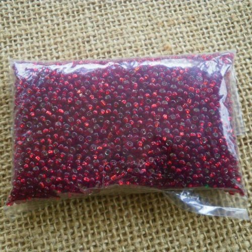 Sachet de 55 grammes de perles rocailles semi transparentes 2 mm , coloris rouge