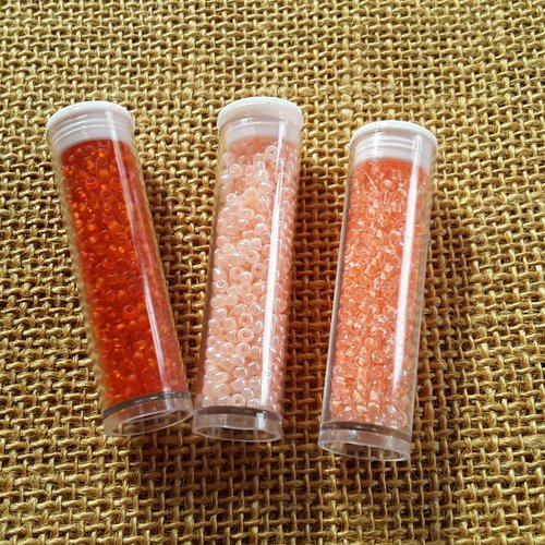 Lot de 3 tubes de 9 grammes de perles de rocailles  , taille 2 mm  , coloris corail et orange