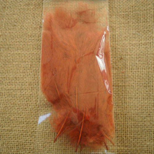 Sachet de quinze plumes duvetées  , coloris orange brique , tailles 10 , 15 cm 