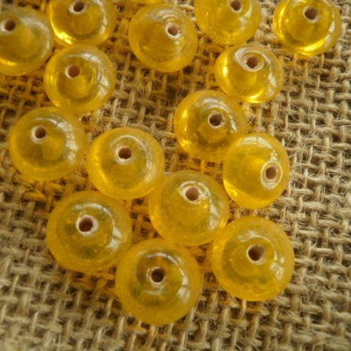 Lot de 16 perles rondes en verre , coloris jaune transparent , taille 1,2/0,5 cm