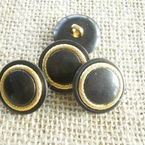 Boutons ronds en plastique  , coloris noir avec un cercle en métal doré , diamètre 23 mm