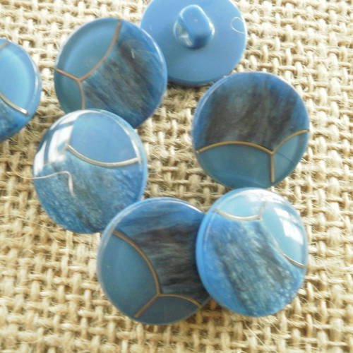 Boutons  ronds , coloris  2 tons de bleu  , séparés par un liseret argenté , diamètre 19 mm 