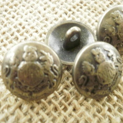 Boutons ronds x 2 en métal bronze ,  motif style ancien sur le dessus , diamètre 17 mm