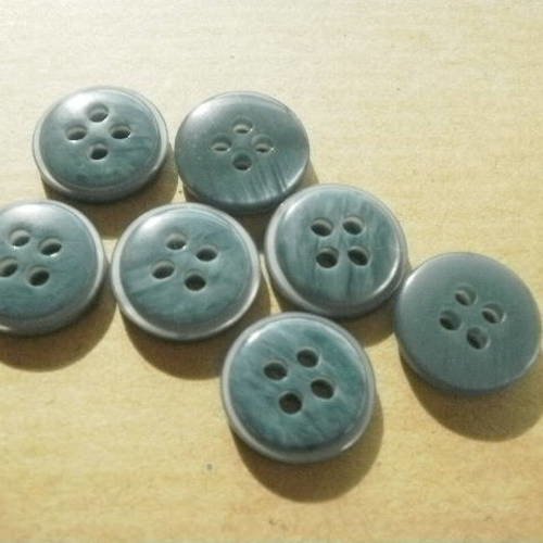 Boutons  ronds  à quatre trous , en plastique  , coloris  bleu jean marbré  , diamètre  15 mm 