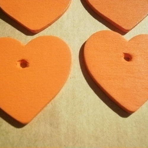 Lot de quatre coeurs  en bois à  coller , coloris   orange 