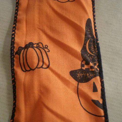 Ruban  en synthetique  , fond orange  avec des motifs noirs d'halloween 