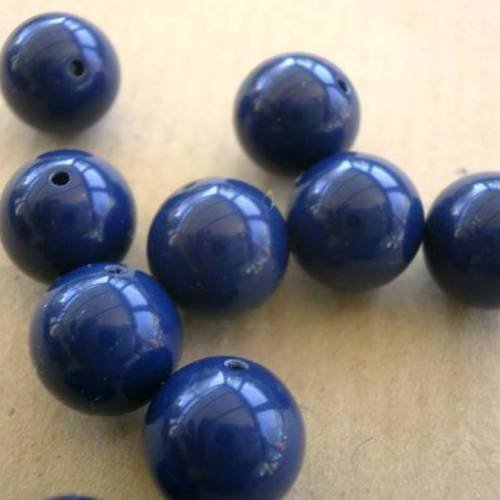 Lot de 8 perles de forme ronde , en matiere plastique  , de couleur  bleu  fonçé 