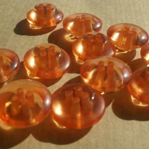 Lot de 2 boutons ronds en plastique  , coloris orange transparent  , diamètre  15 mm 
