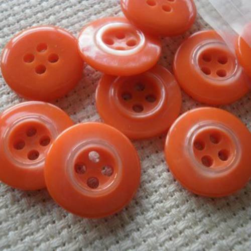 Lot de 2 boutons  ronds à quatre trous en  plastique ,  coloris orange , diamètre  15 mm 