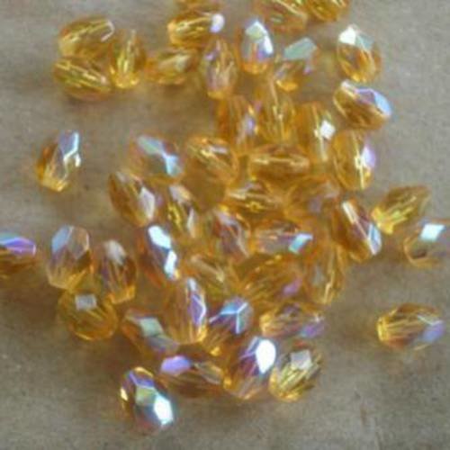 Lot de  25 perles olives en verre   , coloris jaune orangé  , taille  6 x 4 mm 