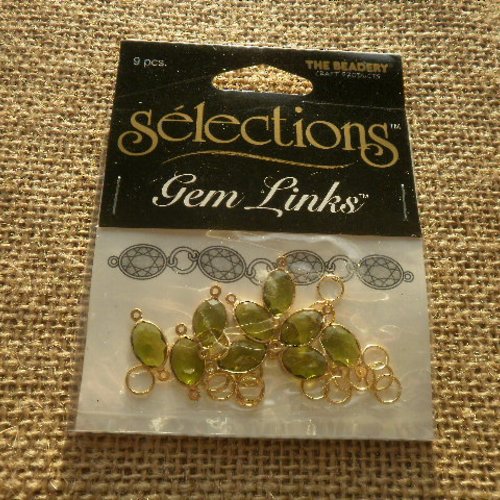Lot de 9 perles connecteurs ovales en métal doré et strass vert  , taille 1,7 / 0,7 cm