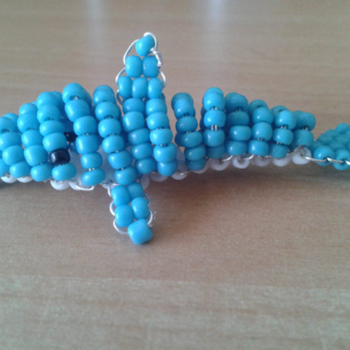 Petit dauphin bleu clair 3d en perles de rocaille