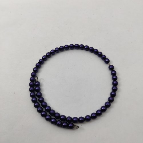 Bracelet jonc réglable orné de perles violettes