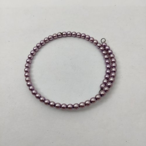Bracelet jonc réglable orné de perles mauves