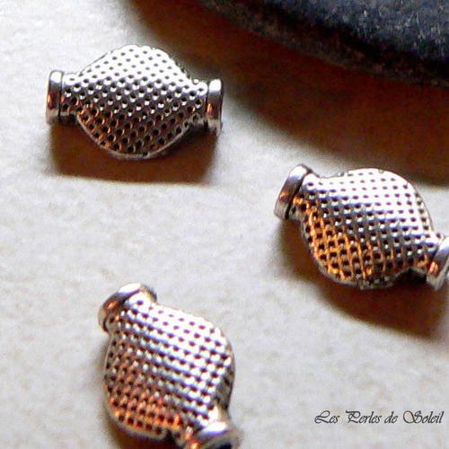 25 perles en metal ovales plates et bombées couleur  argentée12x8mm 