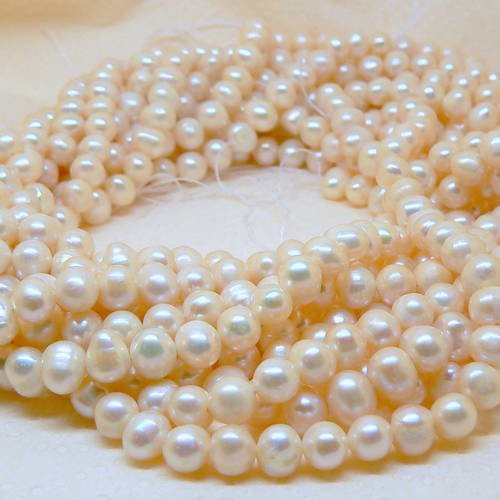 50 veritables perles de culture  d'eau douce nacrées  rondes blanches dim  5-6 mm grade aa 