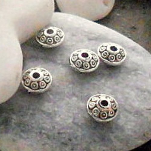 25 perles toupies en metal couleur argent antique décor fleur 6mm