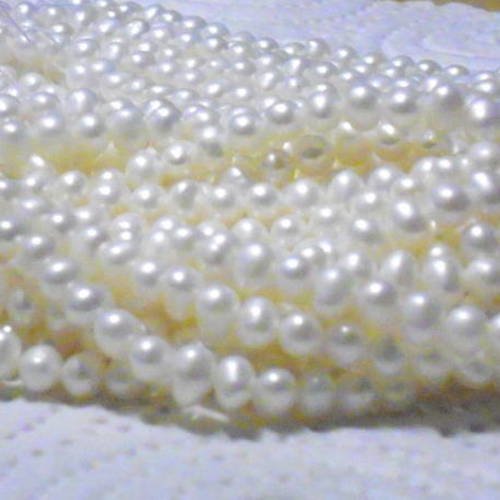 50 veritables perles de culture  d'eau douce nacrées  rondes blanches 2x3mm