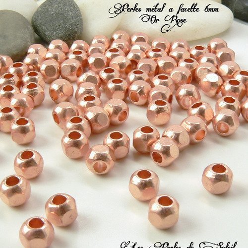 25  perles à facettes metal couleur or rose  rondes dim 6mm 