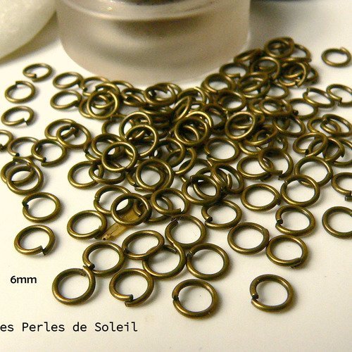50 anneaux ouverts en metal  de couleur bronze 6mm epais.0.9mm