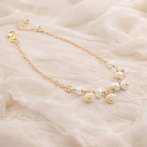 Bracelet de mariée en perles d'eau douce et en or 18 carats