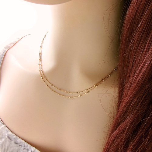 Collier double rang perlé en or 18 carats