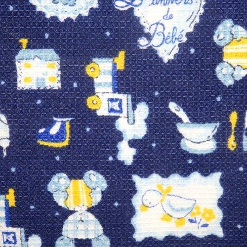 Tissu coton gaufré train ours.. sur fond bleu 150 x 45 cm