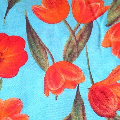Tissu coton  imprimé tulipe rouge fond bleu 150 x 55 cm