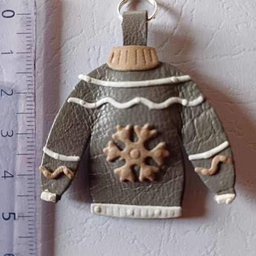 Mini pull moche de noël cuir