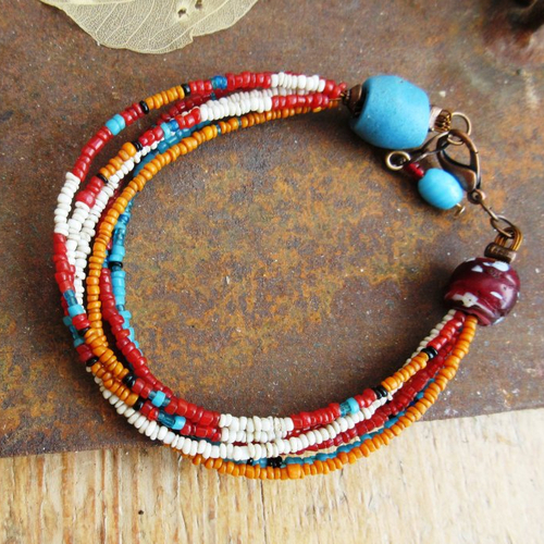 Lumineuse décomposition : un bracelet tribal unisexe de 6 rangs de perles en verre d'afrique  !!!