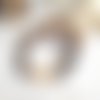 Un bracelet ethnique unisexe ajustable avec perles granit, quartz du néolithique : "un voyage de perles"