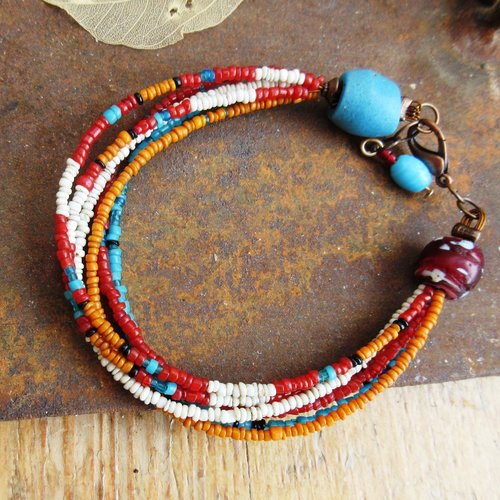 Un bracelet tribal unisexe de 6 rangs de perles en verre d'afrique  !!! : "lumineuse décomposition"